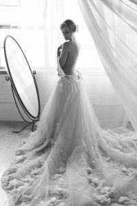 Beautiful black and white bridal boudoir photography, stunning long wedding dress