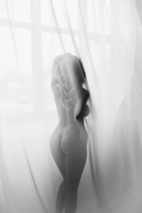 Stunning black and white elegant nude photography, female photographer, comfortable and confident