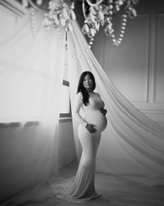 Classy, elegant, contemporary black and white maternity photography, white fabric and chandelier