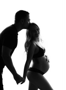 Beautiful contemporary black and white photography, nude maternity, classy, elegant, black and white photographer, couple pregnancy photos, silhouette, kissing her head