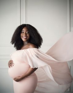 Beautiful black woman with big smile in pink dress flying in the wind Elegant classy maternity photography, Toronto woman photography,diversity