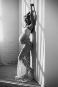 Beautiful contemporary black and white photography, nude maternity, classy, elegant, black and white photographer, white lace maternity dress, sun light, shadow