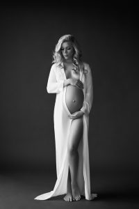 Contemporary black and white class maternity photoshoot, white long robe