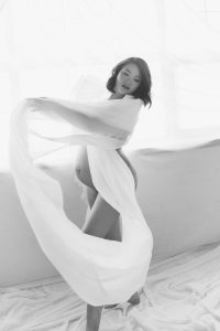 Classy elegant black and white maternity photography Toronto, dreamy, goddess, white dress blowing in the wind