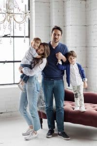 mother and father with two sons , full family photoshoot, lifestyle, fun